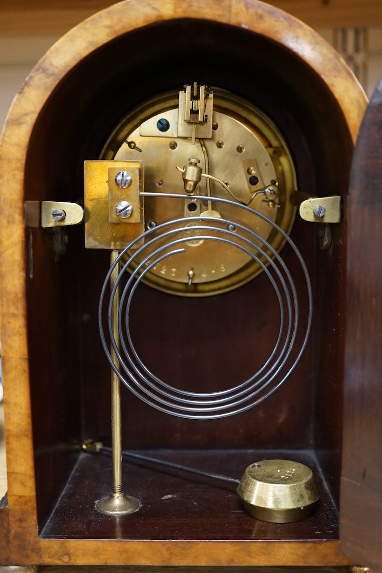 A French late 19th century domed topped burr walnut mantel clock, 23cm high